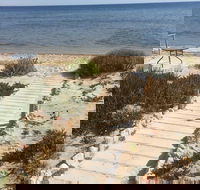 Sittin on the Beach - Local Tourism