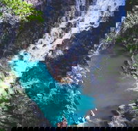 Explore Maleny Montville and take a swim under the waterfall. - Local Tourism