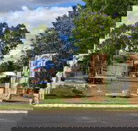 The Fossilised Forest Sculpture - Local Tourism