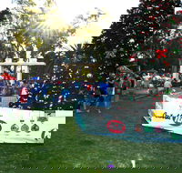 Community Christmas Party and Carols by Candlelight