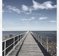 Little Orange Van On The Foreshore - Local Tourism