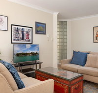 Cosy Family Apartment with Parking and Balconies - Accommodation Australia