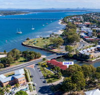 Elegant Waterfront Gem where the Ocean meets the Canal - Accommodation Australia