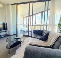 Luxury Level 2-bed 2-bath City View Apt in Olympic Park - Accommodation Australia