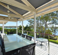Morisset Bay Waterfront Views Lake House looking over Trinity Marina - Accommodation Australia