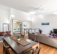 Unit 4 Rainbow Surf - Modern double storey townhouse with large shared pool close to beach and shop - Accommodation Australia