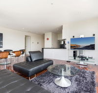3-Bed Apartment with Parking Near Parks and Dining - Accommodation Australia